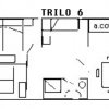 Piantina di un trilocale, cucina a angolo e zona pranzo.